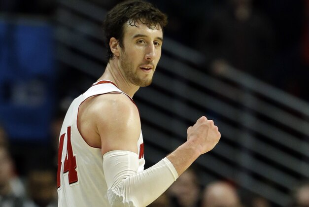 Wisconsin's Frank Kaminsky (44) celebrates in the second half of an NCAA college basketball game in the championship of the Big Ten Conference tournament in Chicago, Sunday, March 15, 2015. Wisconsin defeated Michigan State 80-69 in overtime. (AP Photo/Michael Conroy)