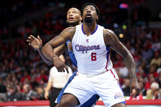 LOS ANGELES, CA - MARCH 09:  DeAndre Jordan #6 of the Los Angeles Clippers boxes out against Adreian Payne #3 of the Minnesota Timberwolves at Staples Center on March 9, 2015 in Los Angeles, California.  The Clippers won 89-76.  NOTE TO USER: User expressly acknowledges and agrees that, by downloading and or using this photograph, User is consenting to the terms and conditions of the Getty Images License Agreement.  (Photo by Stephen Dunn/Getty Images)