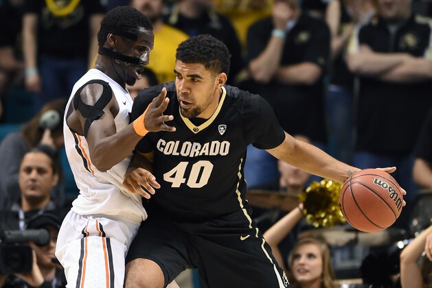 LAS VEGAS, NV - MARCH 11:  Josh Scott #40 of the Colorado Buffaloes is guarded by Daniel Gomis #14 of the Oregon State Beavers during a first-round game of the Pac-12 Basketball Tournament at the MGM Grand Garden Arena on March 11, 2015 in Las Vegas, Nevada. Colorado won 78-71.  (Photo by Ethan Miller/Getty Images)