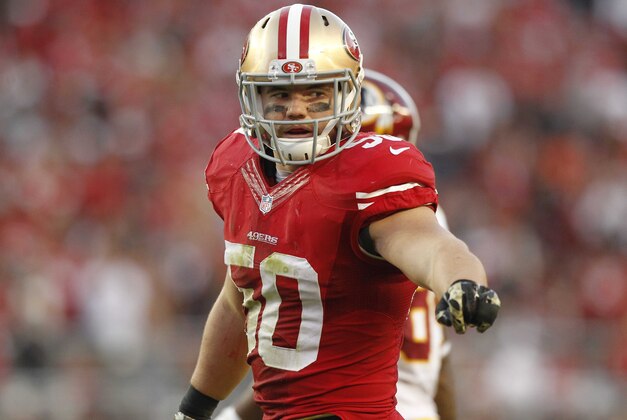 Nov 23, 2014; Santa Clara, CA, USA; San Francisco 49ers inside linebacker Chris Borland (50) stands on the field against the Washington Redskins in the fourth quarter at Levi's Stadium. The 49ers defeated the Redskins 17-13. Mandatory Credit: Cary Edmondson-USA TODAY Sports