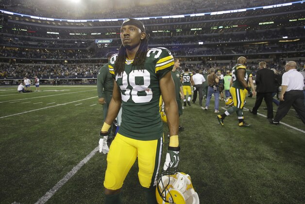 Green Bay Packers cornerback Tramon Williams (38) walks off the field after the NFL football game against the Dallas Cowboys Sunday, Dec. 15, 2013, in Arlington, Texas. (AP Photo/Tony Gutierrez)