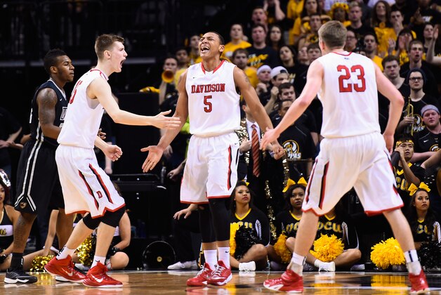 NEW YORK, NY - MARCH 14:  Jordan Barham #5 of the Davidson Wildcats reacts to a basket with teammates Oskar Michelsen #15 and Peyton Aldridge #23 during a semifinal game against the Virginia Commonwealth Rams in the 2015 Men's Atlantic 10 Basketball Tournament at the Barclays Center on March 14, 2015 in the Brooklyn borough of New York City.  (Photo by Alex Goodlett/Getty Images)