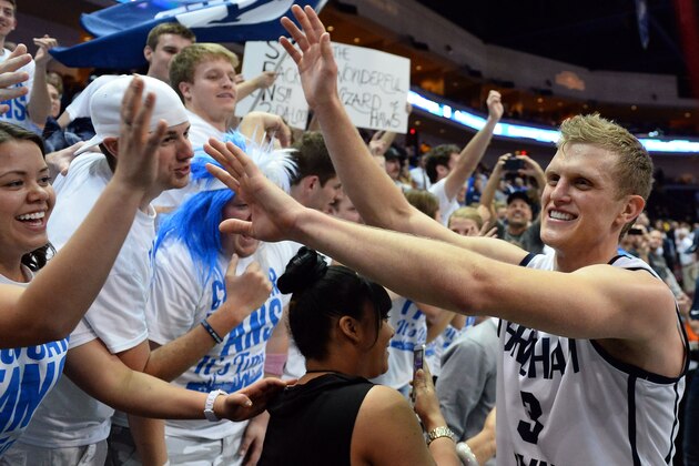 LAS VEGAS, NV - MARCH 10:  Tyler Haws #3 of the Brigham Young Cougars celebrates with fans after defeating the San Francisco Dons 79-77 in overtime to win a semifinal game of the West Coast Conference Basketball tournament at the Orleans Arena on March 10, 2014 in Las Vegas, Nevada.  (Photo by Ethan Miller/Getty Images)