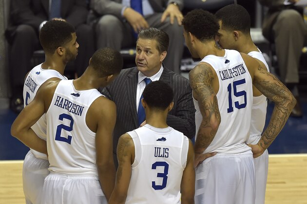 Kentucky head coach John Calipari speaks to his team during the second half of the NCAA college basketball Southeastern Conference tournament championship game against Arkansas, Sunday, March 15, 2015, in Nashville, Tenn. Kentucky won 78-63.(AP Photo/Mike Stewart)
