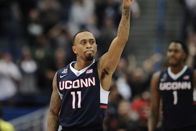 Connecticut’s Ryan Boatright points during the second half of an NCAA college basketball game against Cincinnati in the quarterfinals of the American Athletic Conference tournament, Friday, March 13, 2015, in Hartford, Conn. UConn won 57-54. (AP Photo/Jessica Hill)