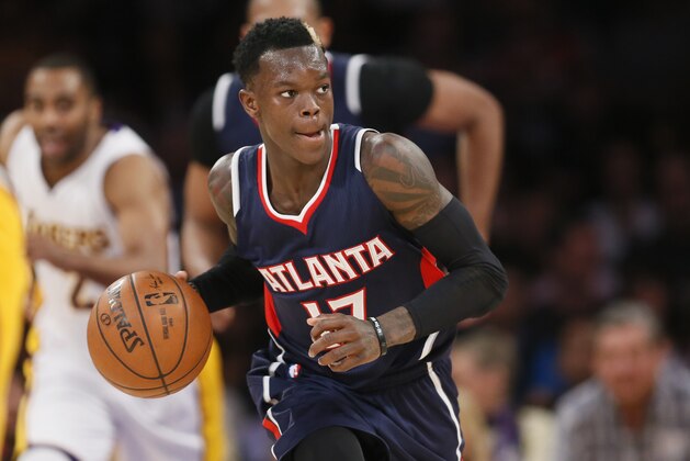 Atlanta Hawks' Dennis Schroder dribbles against the Los Angeles Lakers during the first half of an NBA Basketball game, Sunday, March 15, 2015, in Los Angeles. (AP Photo/Danny Moloshok)