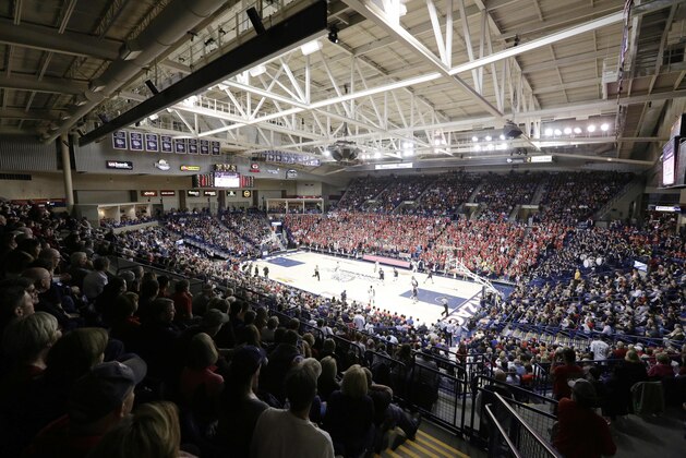 Fans watch the second half of an NCAA college basketball game between Saint Mary's and Gonzaga at the McCarthey Athletic Center in Spokane, Wash., Thursday, Jan. 22, 2015.  (AP Photo/Young Kwak)