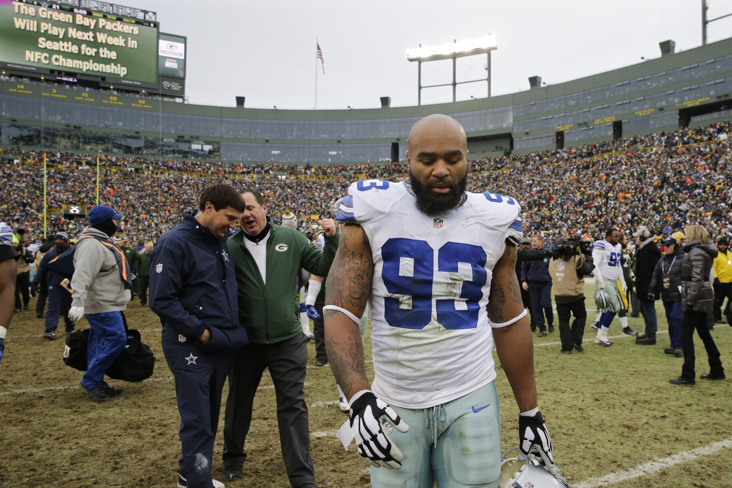 Dallas Cowboys defensive end Anthony Spencer (93) walks off the field after an NFL divisional playoff football game against the Green Bay Packers Sunday, Jan. 11, 2015, in Green Bay, Wis. The Packers won 26-21. (AP Photo/Nam Y. Huh) Dallas Cowboys defensive end Anthony Spencer (93) walks off the field after an NFL divisional playoff football game against the Green Bay Packers Sunday, Jan. 11, 2015, in Green Bay, Wis. The Packers won 26-21. (AP Photo/Nam Y. Huh)