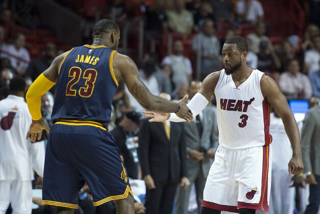Mar 16, 2015; Miami, FL, USA; Cleveland Cavaliers forward LeBron James (23) and Miami Heat guard Dwyane Wade (3) shake hands before the start of the game at American Airlines Arena. Mandatory Credit: Tommy Gilligan-USA TODAY Sports