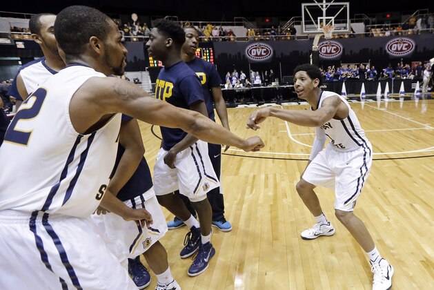 Murray State guard Cameron Payne, right, dances with T.J. Sapp (22), left, after Murray State defeated Morehead State 80-77 in an NCAA college basketball game in the semifinals of the Ohio Valley Conference tournament Friday, March 6, 2015, in Nashville, Tenn. (AP Photo/Mark Humphrey)