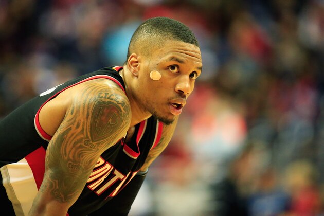 WASHINGTON, DC - MARCH 16: Damian Lillard #0 of the Portland Trail Blazers looks on during the closing moments of their 105-97 loss to the Washington Wizards at Verizon Center on March 16, 2015 in Washington, DC.  NOTE TO USER: User expressly acknowledges and agrees that, by downloading and or using this photograph, User is consenting to the terms and conditions of the Getty Images License Agreement.  (Photo by Rob Carr/Getty Images)
