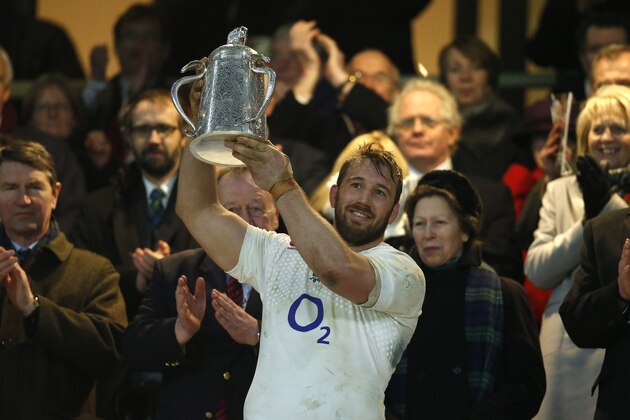 England’s Chris Robshaw holds aloft the Calcutta Cup after his side's 25-13 win in the Six Nations rugby union match between England and Scotland at Twickenham stadium in London, Saturday, March, 14, 2015. (AP Photo/Alastair Grant)