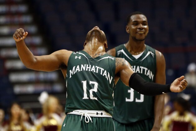 Mar 9, 2015; Albany, NY, USA; Manhattan Jaspers guard RaShawn Stores (12) and Manhattan Jaspers guard Donovan Kates (33) react against the Iona Gaels during the second half in the championship game of the MAAC Conference Tournament at Times Union Center. Mandatory Credit: Mark L. Baer-USA TODAY Sports