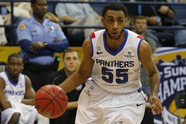 Georgia State guard Ryan Harrow (55) in the second half of an NCAA college basketball game against Louisiana Lafayette for the Sun Belt Conference tournament championship in New Orleans, Sunday, March 16, 2014. University of Lafayette defeated Georgia State 82-81. (AP Photo/Bill Haber)