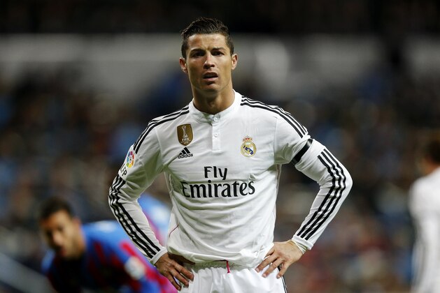 Real Madrid's Cristiano Ronaldo from Portugal reacts during a La Liga soccer match between Real Madrid and Levante at the Santiago Bernabeu stadium in Madrid, Spain, Sunday, March 15, 2015. (AP Photo/Daniel Ochoa de Olza)