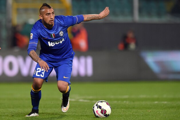 PALERMO, ITALY - MARCH 14:  Arturo Vidal of Juventus in action during the Serie A match between US Citta di Palermo and Juventus FC  at Stadio Renzo Barbera on March 14, 2015 in Palermo, Italy.  (Photo by Tullio M. Puglia/Getty Images)