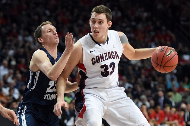 LAS VEGAS, NV - MARCH 10:  Kyle Wiltjer #33 of the Gonzaga Bulldogs drives against Skyler Halford #23 of the Brigham Young Cougars during the championship game of the West Coast Conference Basketball tournament at the Orleans Arena on March 10, 2015 in Las Vegas, Nevada. Gonzaga won 91-75.  (Photo by Ethan Miller/Getty Images)