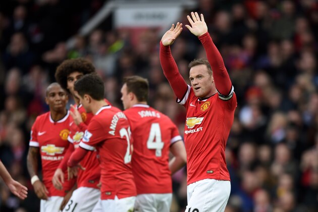 MANCHESTER, ENGLAND - MARCH 15:  Wayne Rooney of Manchester United celebrates after scoring his team's third goal during the Barclays Premier League match between Manchester United and Tottenham Hotspur at Old Trafford on March 15, 2015 in Manchester, England.  (Photo by Michael Regan/Getty Images)