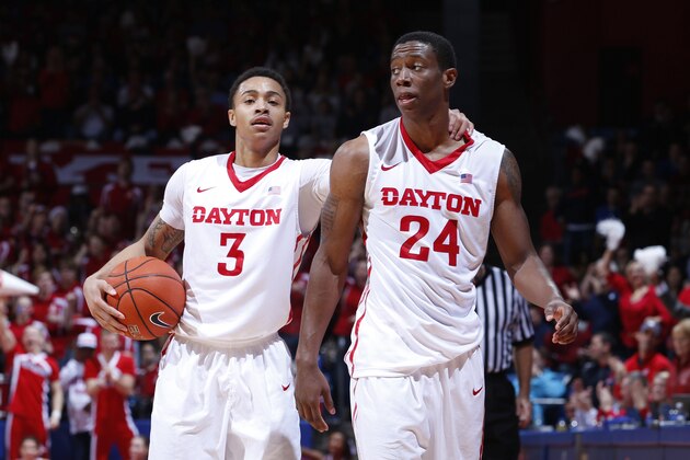 DAYTON, OH - DECEMBER 23: Kyle Davis #3 and Jordan Sibert #24 of the Dayton Flyers celebrate during the game against the Georgia Tech Yellow Jackets at UD Arena on December 23, 2014 in Dayton, Ohio. Dayton defeated Georgia Tech 75-61. (Photo by Joe Robbins/Getty Images)
