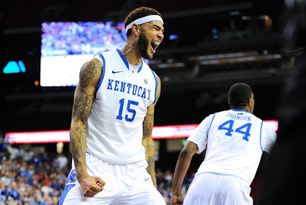 Mar 14, 2014; Atlanta, GA, USA; Kentucky Wildcats forward Willie Cauley-Stein (15) reacts after dunking against the LSU Tigers  during the second half in the quarterfinals of the SEC college basketball tournament at Georgia Dome. Kentucky defeated LSU 85-67. Mandatory Credit: Dale Zanine-USA TODAY Sports