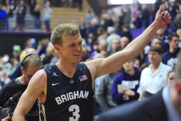 BYU's Tyler Haws gives a thumbs-up to fans as he leaves the court at the end of an NCAA college basketball game against Portland in Portland, Ore., Thursday, Feb. 26, 2015. Haws scored 21 points in passing Jimmer Fredette as BYU's all-time leading scorer and leading the Cougars to an 82-69 victory. Haws now has 2.614 points. (AP Photo/Greg Wahl-Stephens)
