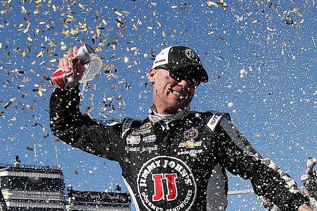 AVONDALE, AZ - MARCH 15:  Kevin Harvick, driver of the #4 Jimmy John's/ Budweiser Chevrolet, celebrates in victory lane after winning the NASCAR Sprint Cup Series CampingWorld.com 500 at Phoenix International Raceway on March 15, 2015 in Avondale, Arizona.  (Photo by Chris Graythen/Getty Images)