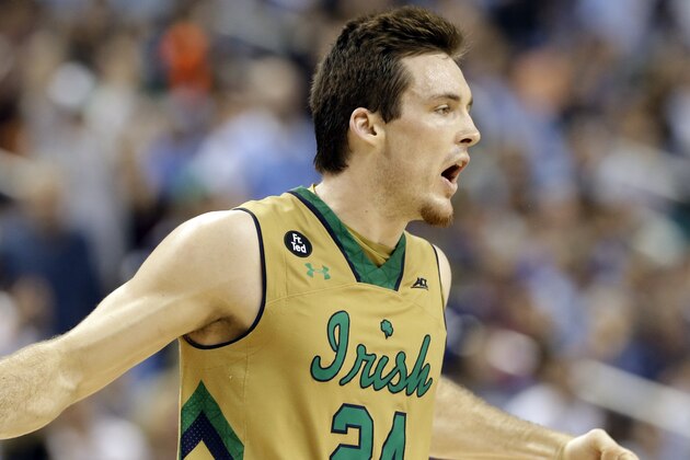 Notre Dame's Pat Connaughton (24) celebrates after a three-point basket against North Carolina during the second half of an NCAA college basketball game in the championship of the Atlantic Coast Conference tournament Saturday, March 14, 2015, in Greensboro, N.C. (AP Photo/Gerry Broome)