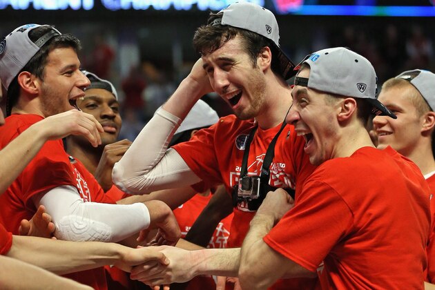 CHICAGO, IL - MARCH 15: (L-R) Duje Dukan #13, Frank Kaminsky #44 and Josh Gasser #21 of the Wisconsin Badgers celebrate after winning the Championship game of the 2015 Big Ten Men's Basketball Tournament against the Michigan State Spartans at the United Center on March 15, 2015 in Chicago, Illinois. Wisconsin defeated Michigan State 80-69 in overtime. (Photo by Jonathan Daniel/Getty Images)