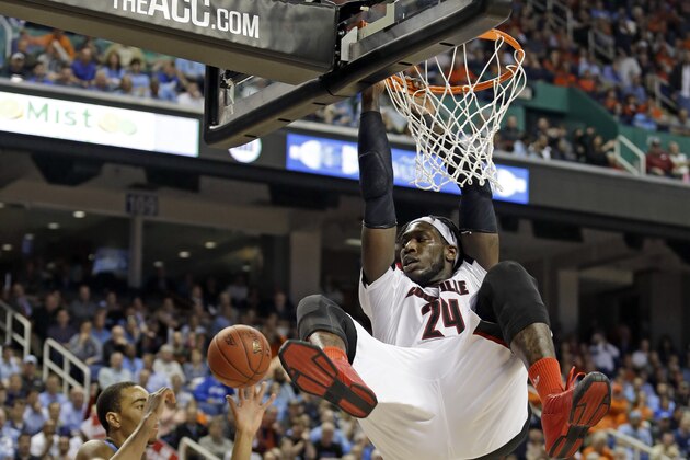 Louisville's Montrezl Harrell (24) dunks against North Carolina's Brice Johnson (11) during the second half of an NCAA college basketball game in the quarterfinals of the Atlantic Coast Conference tournament in Greensboro, N.C., Thursday, March 12, 2015. (AP Photo/Bob Leverone)