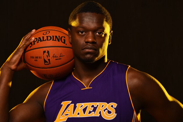 TARRYTOWN, NY - AUGUST 3:  Julius Randle #30 of the Los Angeles Lakers poses for a portrait during the 2014 NBA rookie photo shoot on August 3, 2014 at the Madison Square Garden Training Facility in Tarrytown, New York. NOTE TO USER: User expressly acknowledges and agrees that, by downloading and or using this photograph, User is consenting to the terms and conditions of the Getty Images License Agreement. Mandatory Copyright Notice: Copyright 2014 NBAE (Photo by Brian Babineau /NBAE via Getty Images)