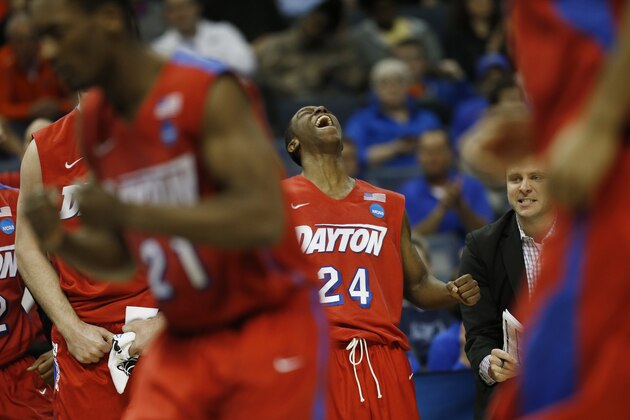 Dayton guard Jordan Sibert (24) celebrates a three-point shot against Stanford during the second half in a regional semifinal game at the NCAA college basketball tournament, Thursday, March 27, 2014, in Memphis, Tenn. Dayton won 82-72. (AP Photo/John Bazemore)