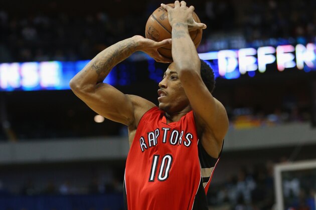 DALLAS, TX - FEBRUARY 24:  DeMar DeRozan #10 of the Toronto Raptors takes a shot against the Dallas Mavericks at American Airlines Center on February 24, 2015 in Dallas, Texas.  NOTE TO USER: User expressly acknowledges and agrees that, by downloading and or using this photograph, User is consenting to the terms and conditions of the Getty Images License Agreement.  (Photo by Ronald Martinez/Getty Images)