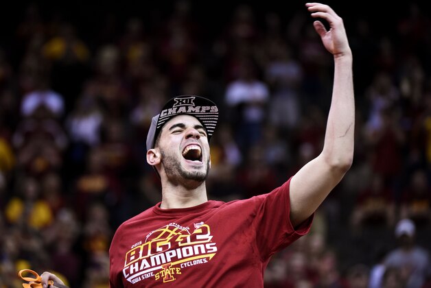 KANSAS CITY, MO - MARCH 14:  Most outstanding player Georges Niang #31 of the Iowa State Cyclones cuts down a piece of the net after their 70 to 66 victory over the Kansas Jayhawks during the championship game of the Big 12 Basketball Tournament at Sprint Center on March 14, 2015 in Kansas City, Missouri.  (Photo by Ed Zurga/Getty Images)
