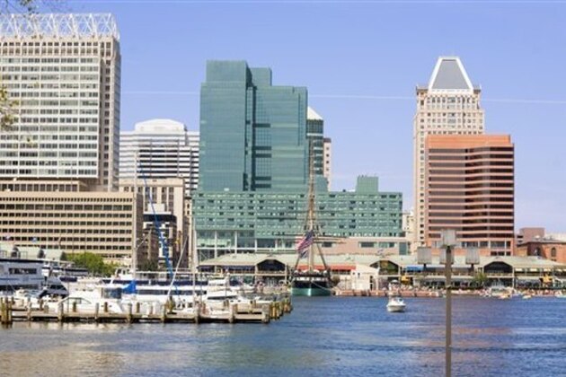 Buildings at the waterfront, Inner Harbor, Baltimore, Maryland, USA (Glow Images via AP Images)