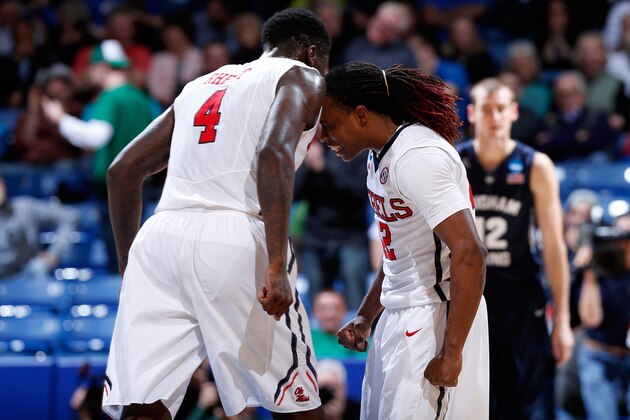 DAYTON, OH - MARCH 17:  M.J. Rhett #4 celebrates with Stefan Moody #42 of the Mississippi Rebels against the Brigham Young Cougars during the first round of the 2015 NCAA Men's Basketball Tournament at UD Arena on March 17, 2015 in Dayton, Ohio.  (Photo by Joe Robbins/Getty Images)