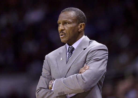 Toronto Raptors head coach Dwane Casey watches his team during the first half of an NBA basketball game against the San Antonio Spurs, Tuesday, March 10, 2015, in San Antonio. (AP Photo/Eric Gay)