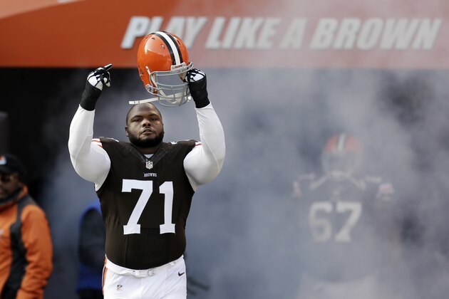 Cleveland Browns nose tackle Ahtyba Rubin (71) runs onto the field before an NFL football game against the Indianapolis Colts Sunday, Dec. 7, 2014, in Cleveland. (AP Photo/Tony Dejak)