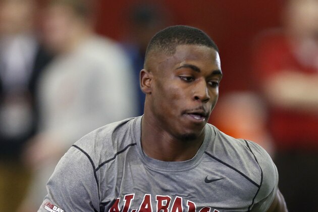 Running back T.J. Yeldon runs drills during Alabama's Pro Day, Wednesday, March 11, 2015, in Tuscaloosa, Ala. The event is to showcase players for the upcoming NFL football draft. (AP Photo/Butch Dill)