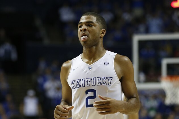 Kentucky guard Aaron Harrison (2) runs down the court during the first half of the NCAA college basketball Southeastern Conference tournament championship game against Arkansas, Sunday, March 15, 2015, in Nashville, Tenn. (AP Photo/Steve Helber)