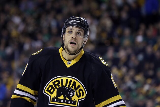 Boston Bruins center Gregory Campbell (11) during a break in the second period of an NHL hockey game against the Buffalo Sabres in Boston, Tuesday, March 17, 2015. (AP Photo/Elise Amendola)
