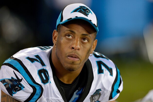 CHARLOTTE, NC - AUGUST 08:  Greg Hardy #76 of the Carolina Panthers watches from the bench during the fourth quarter of a loss to the Buffalo Bills at Bank of America Stadium on August 8, 2014 in Charlotte, North Carolina. Buffalo won 20-18.  (Photo by Grant Halverson/Getty Images)
