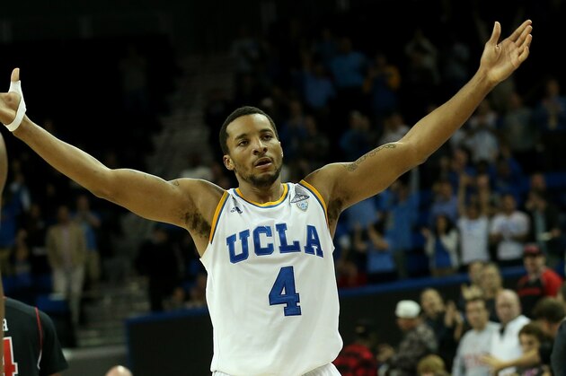 LOS ANGELES, CA - JANUARY 29:  Norman Powell #4 of the UCLA Bruins celebrates after the game against the Utah Utes at Pauley Pavilion on January 29, 2015 in Los Angeles, California. UCLA won 69-59.  (Photo by Stephen Dunn/Getty Images)