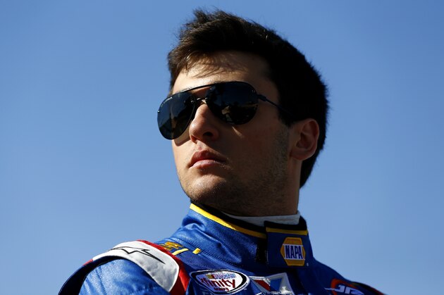 AVONDALE, AZ - MARCH 14:  Chase Elliott, driver of the #9 NAPA Auto Parts Chevrolet, walks on pit row during qualifying for the NASCAR XFINITY Series AXALTA Faster. Tougher. Brighter 200 at Phoenix International Raceway on March 14, 2015 in Avondale, Arizona.  (Photo by Jonathan Ferrey/Getty Images)
