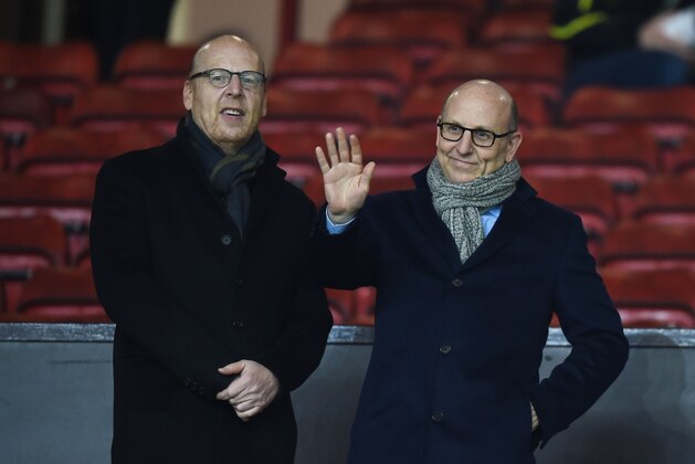 MANCHESTER, ENGLAND - FEBRUARY 11:  Avram Glazer (L) and Joel Glazer, the Co-Chairmen of Manchester United look on during the Barclays Premier League match between Manchester United and Burnley at Old Trafford on February 11, 2015 in Manchester, England.  (Photo by Michael Regan/Getty Images)