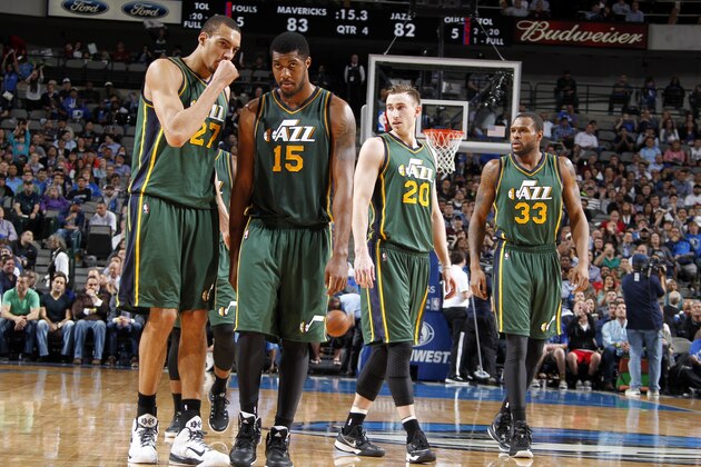 DALLAS, TX - FEBRUARY 11: Rudy Gobert #27, Derrick Favors #15, Gordon Hayward #20, and Trevor Booker #33 of the Utah Jazz stand on the court during a game against the Dallas Mavericks on February 11, 2015 at the American Airlines Center in Dallas, Texas. NOTE TO USER: User expressly acknowledges and agrees that, by downloading and or using this photograph, User is consenting to the terms and conditions of the Getty Images License Agreement. Mandatory Copyright Notice: Copyright 2015 NBAE (Photo by Danny Bollinger/NBAE via Getty Images)