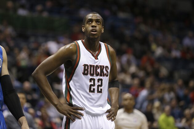 Milwaukee Bucks' Khris Middleton watches a free throw during an NBA basketball game against the Orlando Magic Wednesday, March 11, 2015, in Milwaukee. (AP Photo/Aaron Gash)