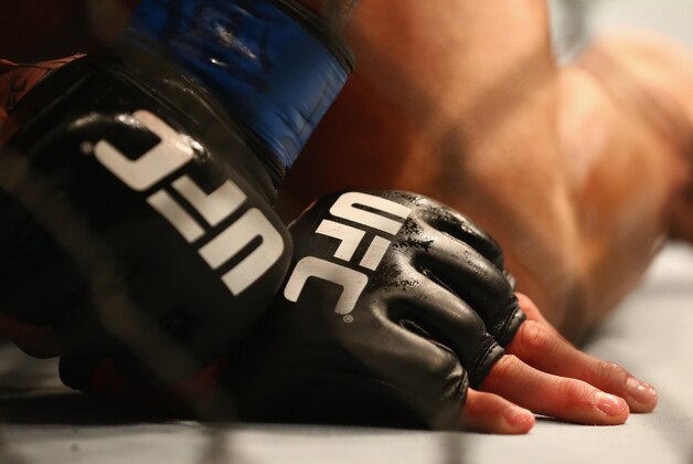 DALLAS, TX - MARCH 14:  A detail of gloves worn by Anthony Pettis and Rafael dos Anjos in the Lightweight Title bout during the UFC 185 event at American Airlines Center on March 14, 2015 in Dallas, Texas.  (Photo by Ronald Martinez/Getty Images)