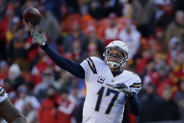 San Diego Chargers quarterback Philip Rivers (17) passes during the second half of NFL football game against the Kansas City Chiefs Sunday, Dec. 28, 2014, in Kansas City, Mo. Kansas City won 19-7. (AP Photo/Charlie Riedel)