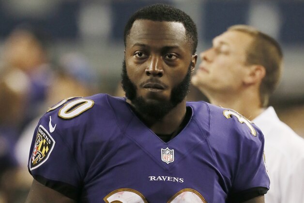 FILE - This is an Aug. 16, 2014, file photo showing Baltimore Ravens running back Bernard Pierce (30) on the sideline during the second half of an NFL preseason football game against the Dallas Cowboys in Arlington, Texas. Police in Maryland say Ravens running back Bernard Pierce has been charged with drunken driving. Baltimore County police say an officer stopped a Ford Mustang that was speeding around 2 a.m. Wednesday, March 18, 2015, in Towson, north of Baltimore.  (AP Photo/Brandon Wade, File)