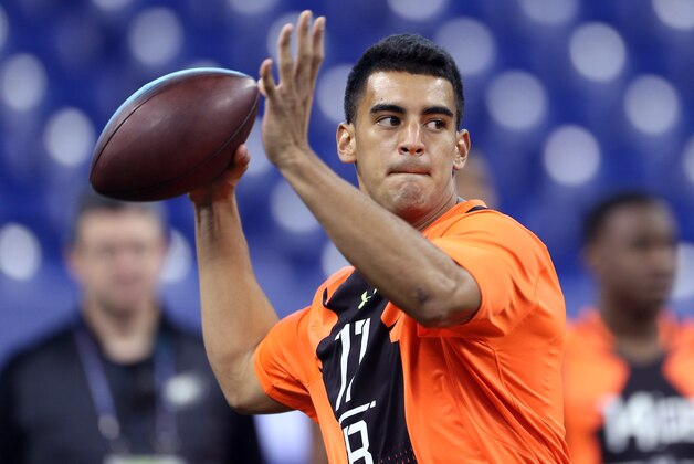 Feb 21, 2015; Indianapolis, IN, USA; Oregon Ducks quarterback Marcus Mariota throws a pass during the 2015 NFL Combine at Lucas Oil Stadium. Mandatory Credit: Brian Spurlock-USA TODAY Sports